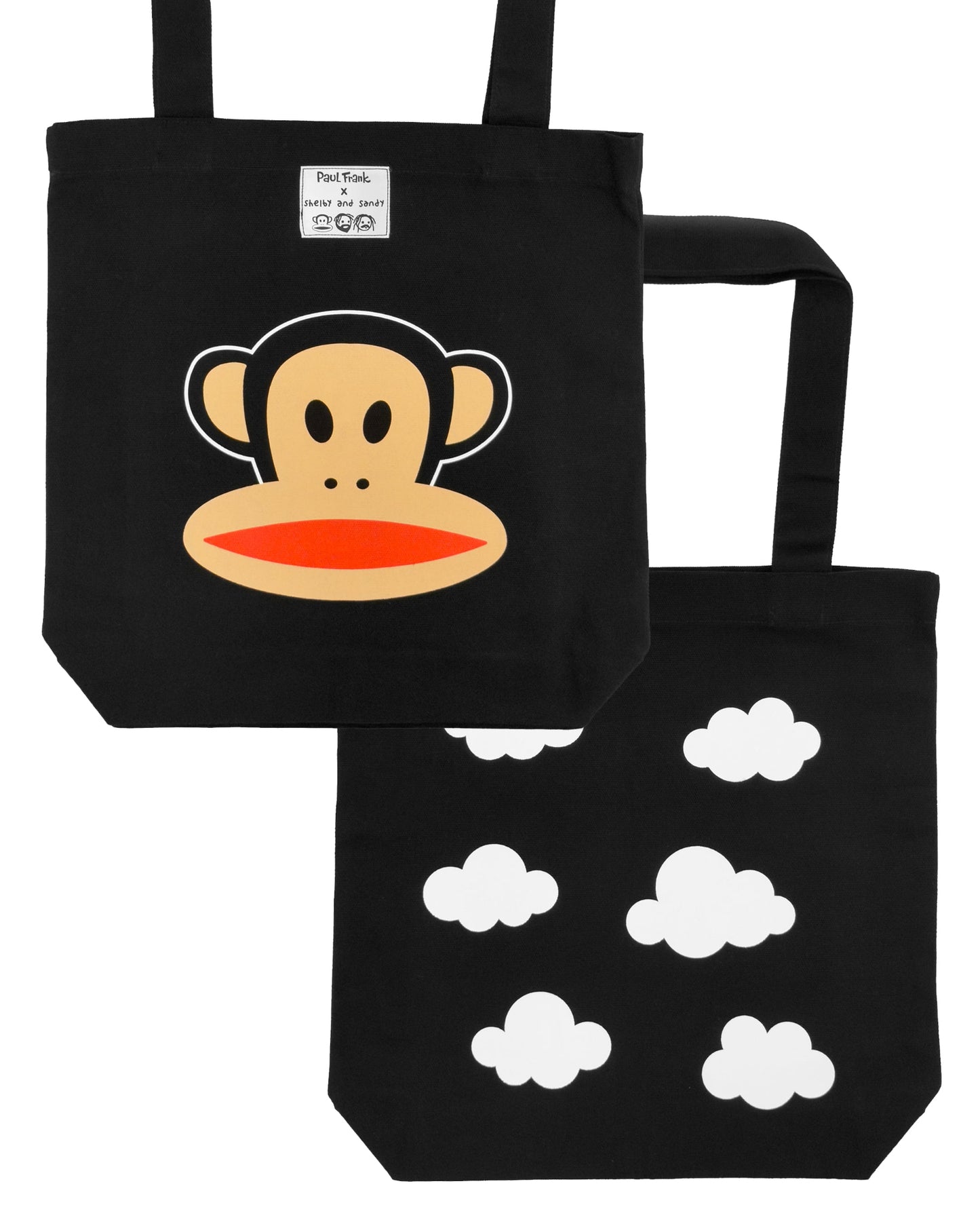 Black tote bag with cartoon monkey face design and a cloud pattern on a back side