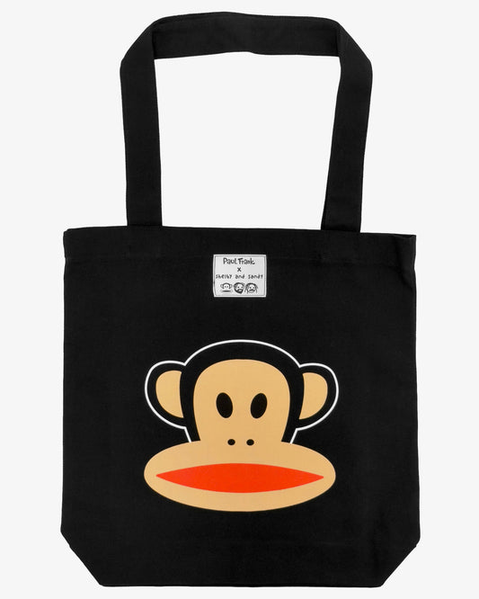 Black tote bag with a monkey face design on a black background