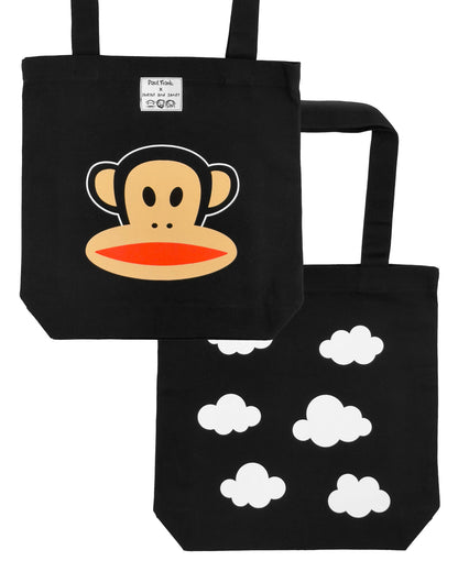 Black tote bag with cartoon monkey face design and a cloud pattern on a back side